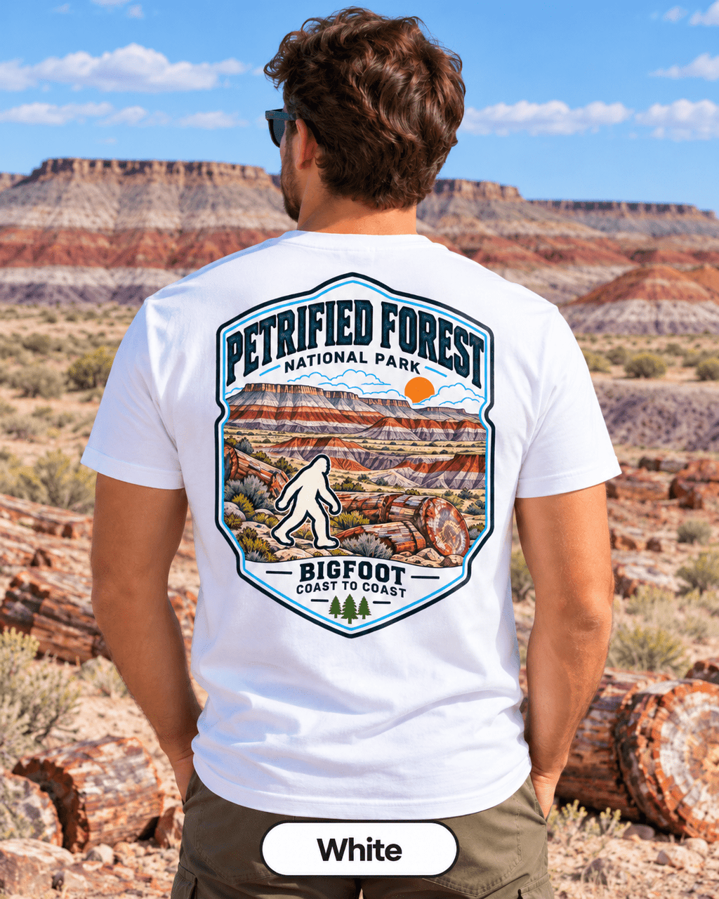Petrified Forest Bigfoot shirt featuring a vintage national park back graphic inspired by petrified logs, painted desert badlands, and wide Arizona sky